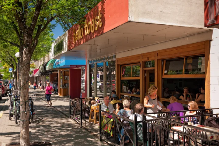 Downtown Kamloops businesses pictured on the City’s business-licensing page. This is a streetscape, not a licensing counter.